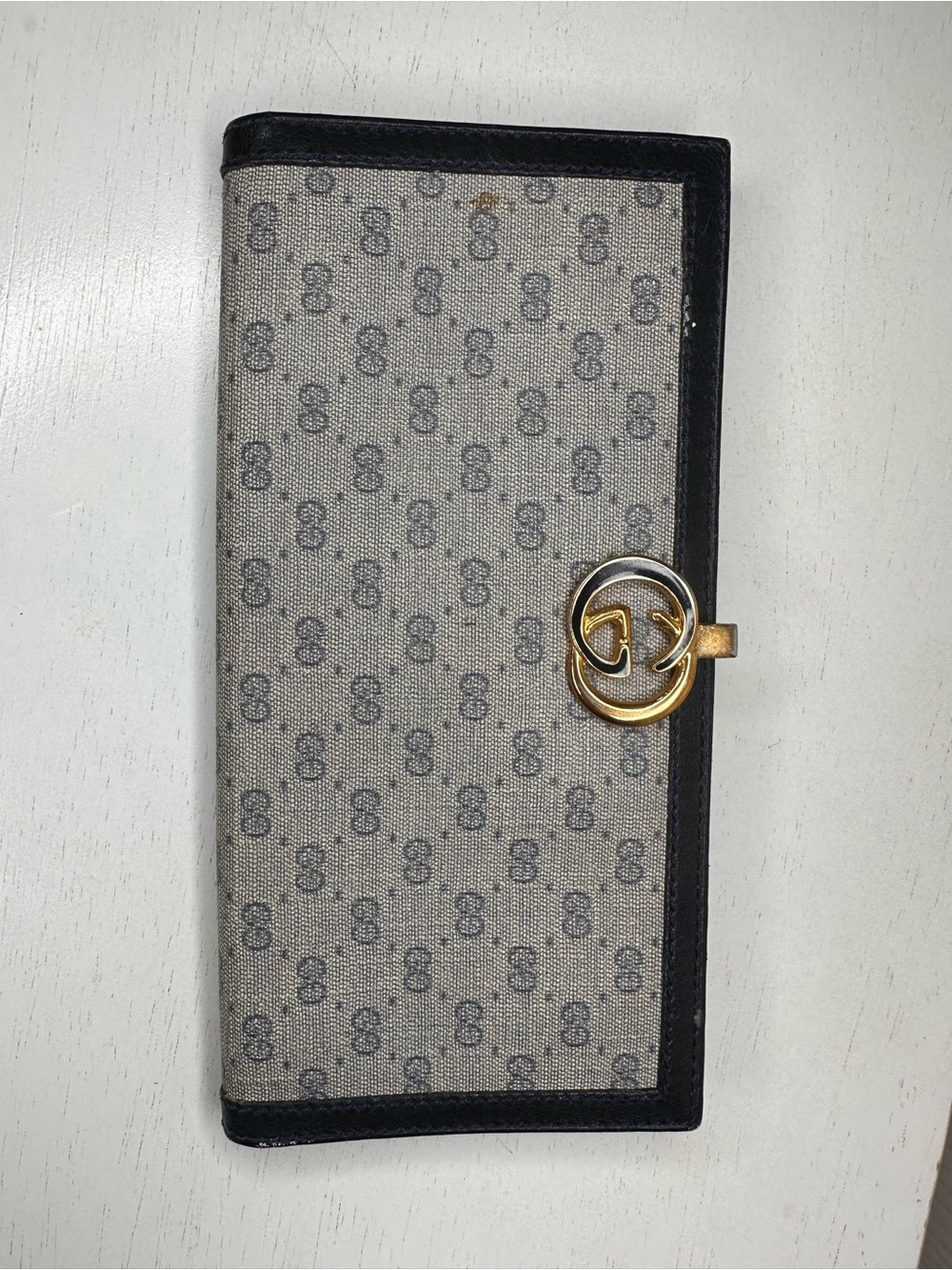 Gucci vintage 1980s checkbook holder. Monogram canvas with gold hardware.